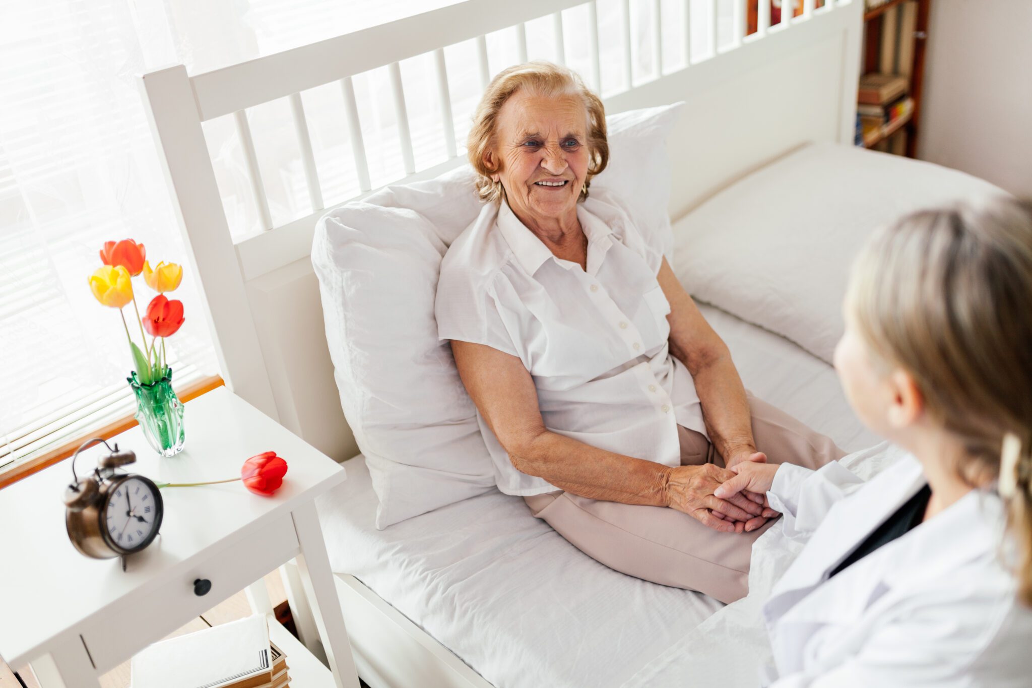 providing-care-for-elderly-doctor-visiting-elderl-2021-08-26-22-39-28-utc-scaled